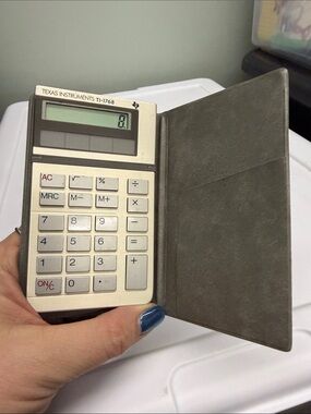Texas Instruments TI-1768 Vintage Pocket Calculator in Silver